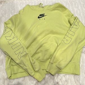 Green Nike sweatshirt, a couple bleach stains